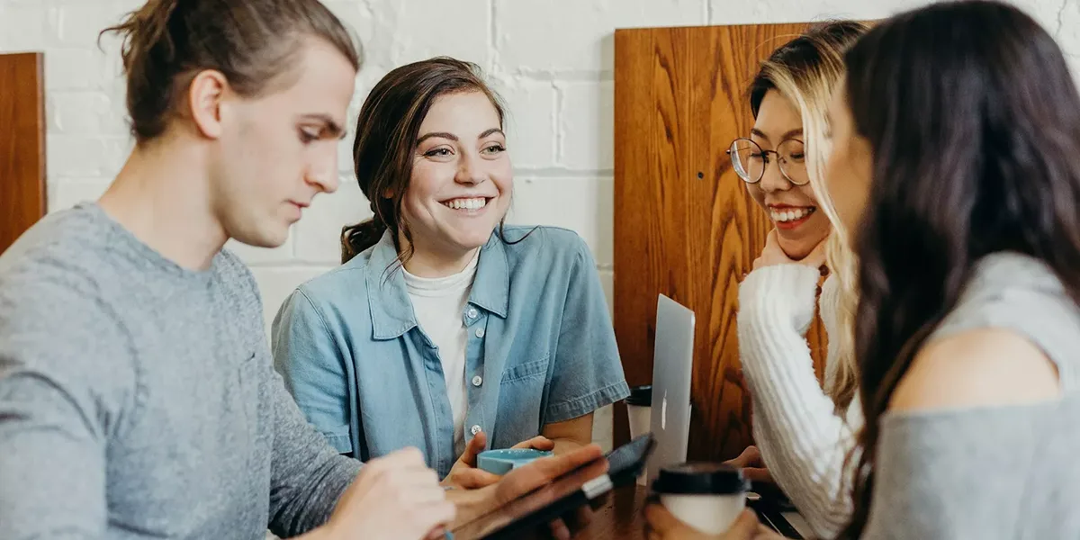 Group of friends in a coffee bar — for an article on group dynamics and the rule of eight