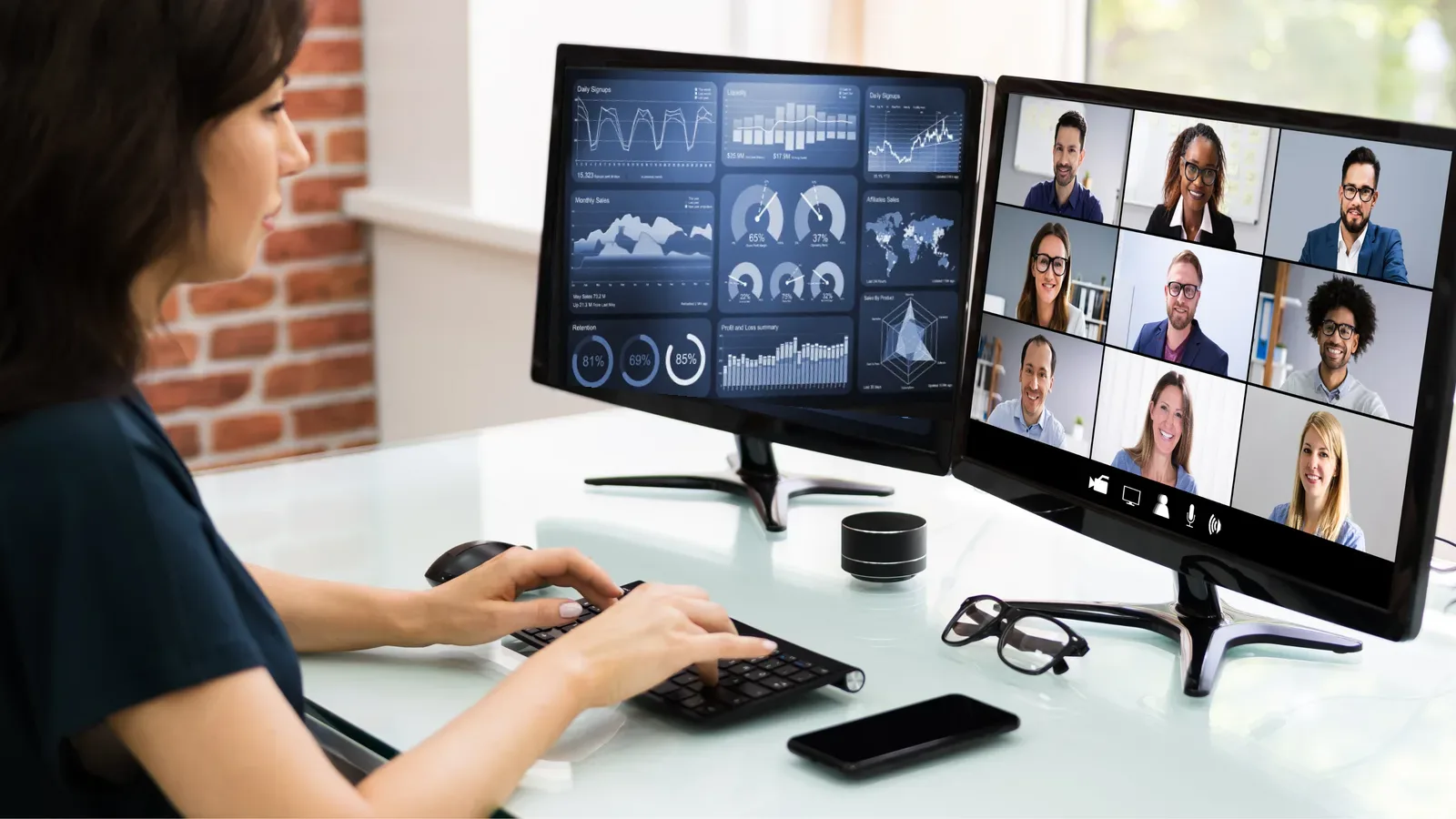 Online conference with participants on screen beside a display showing the figures and results of the programme