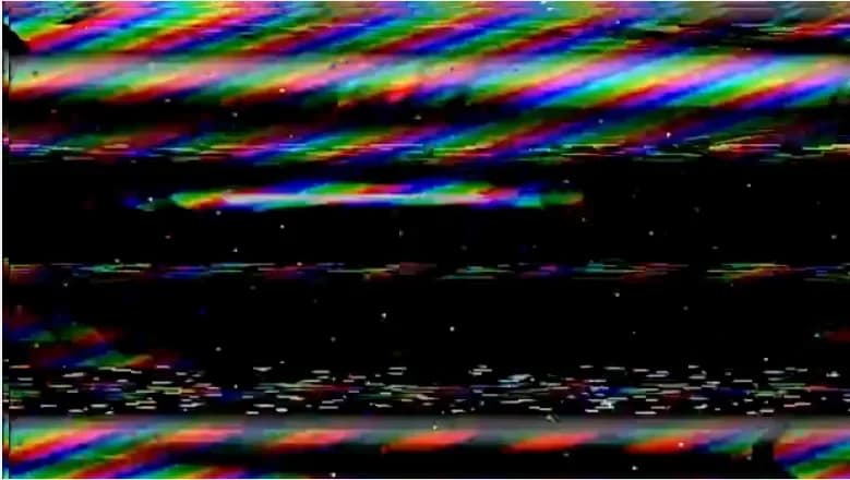 Digital noise and glitch on screen — the start of the cyberattack in R@venHack