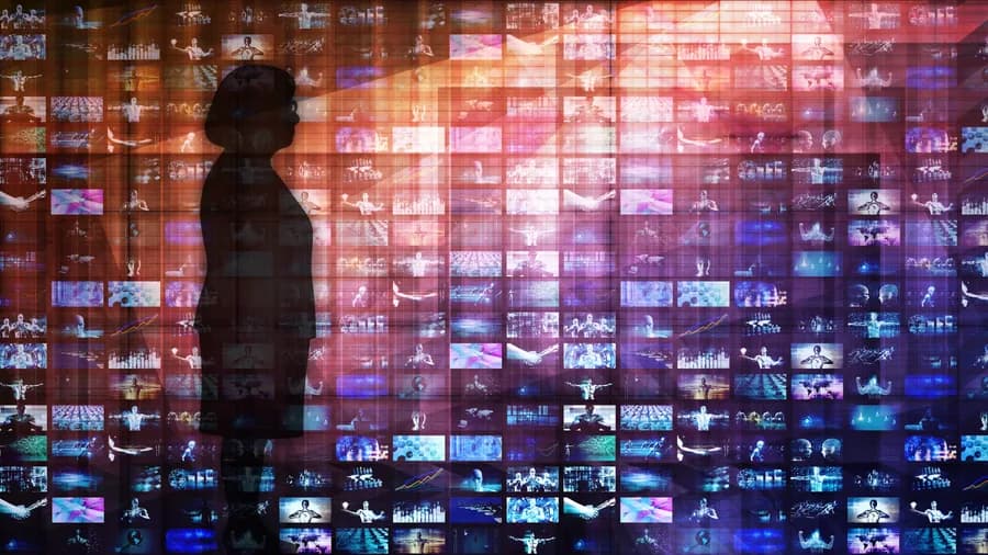 Silhouette against a wall of data streams — the team investigating the attack